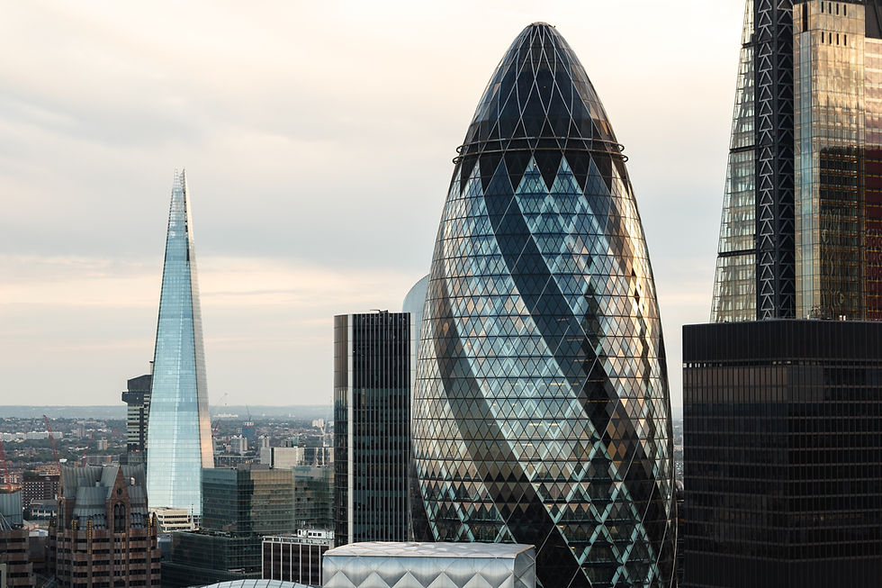 Picture of the Gurkin in the foreground and the shard in the background