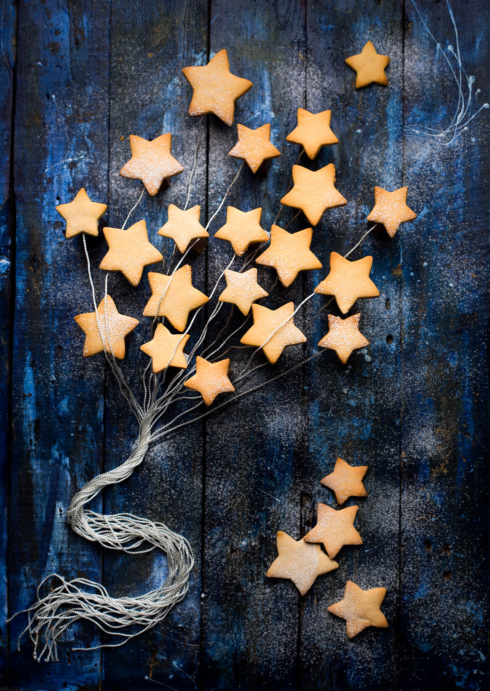 stars attached to strings to look like they are flying