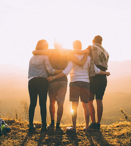 Group of friends looking over mountain (Helena Lopes)