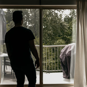tenant looking out the window in Montreal
