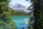 Image of a Canadian lake surrounded by pines and mountains by Bruno Soares