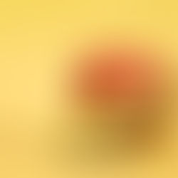 A peach with a tape measure around it, signifying growing your glutes with exercise