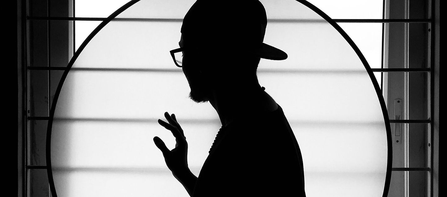 A person trapped in a circular visual target, symbolising ego entrapment.