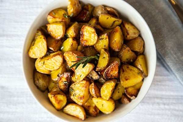 Patate cotte in forno a legna