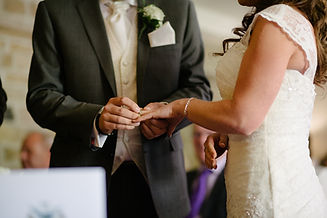 Hawaiian Wedding putting on ring