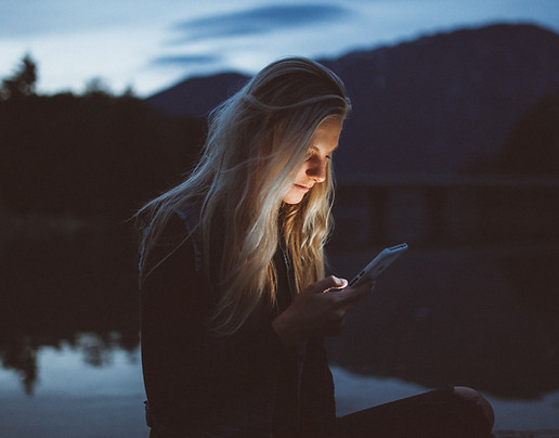 Women looks at her phone
