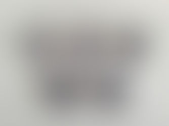 Clocks on a wall depicting the time in five different cities around the world