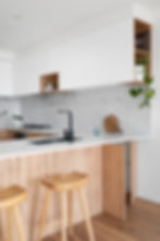 Modern kitchen with black taps and stone benchtops house extensions perth home renovations perth granny flats perth bathroom remodel perth kitchen renovations perth custom home additions perth perth home improvement