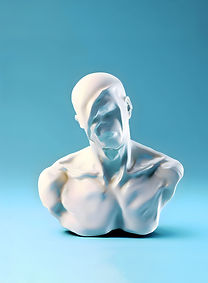 Sculpture bust of a male from the waist up, with its face removed