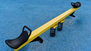 A balanced teeter-totter representing the choice between the standard deduction and itemized deductions, symbolizing how taxpayers weigh both options when filing their taxes.
