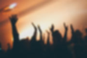 Image of church worshipping with words: Servicio de Adoracion. Domingos 1:30pm. Bienvenidos. Stock Image by Mic Narra
