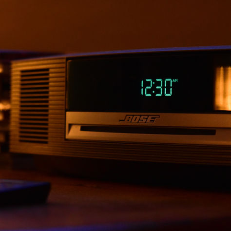 An alarm clock displaying 12:30 AM