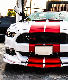 Racing stripes on a vehicle as part of the Motor City Restyling services offered
