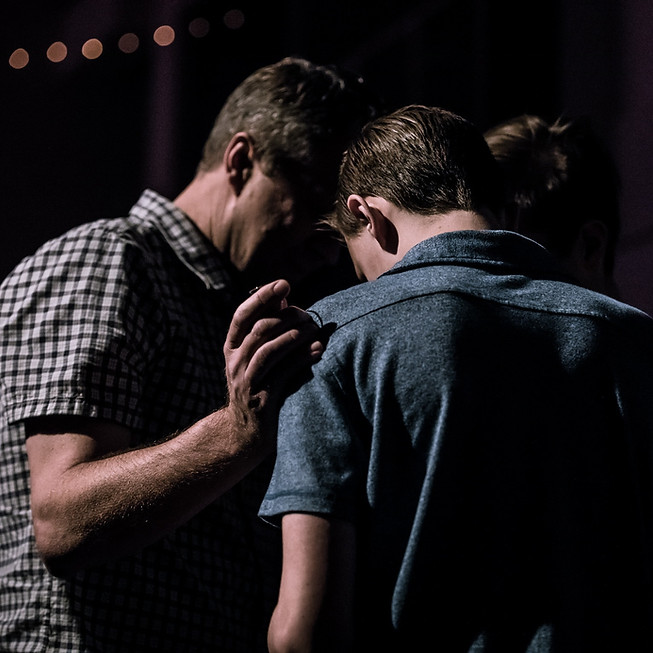 group praying together