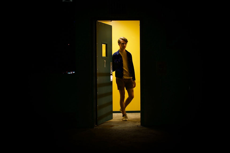 Man with his foot in the door