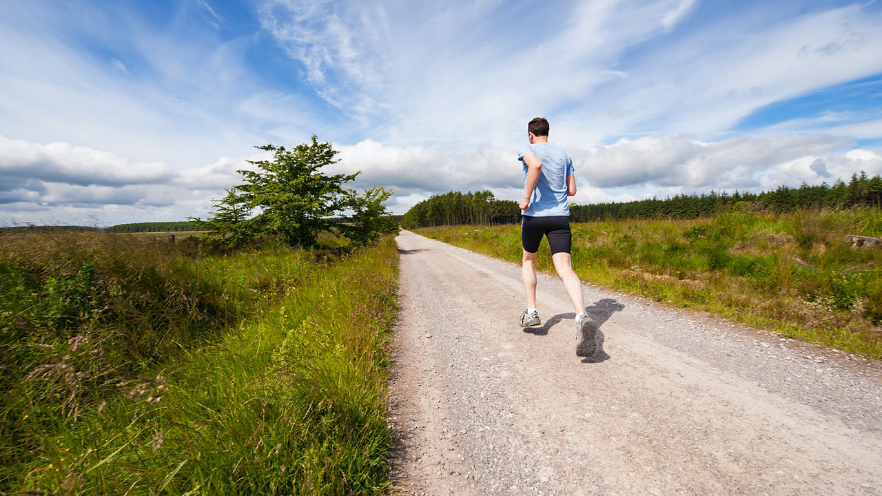 Man running through the countryside