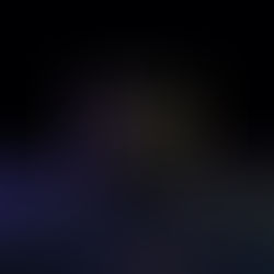 colorful letters spelling out Google on black cube