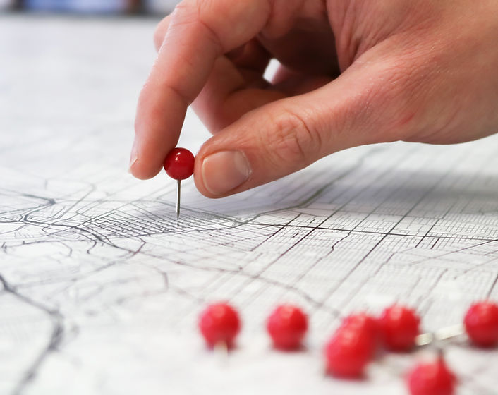 New interior of living room with comfortable armchair, chest of drawers, folding screen
