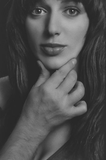 Woman touching her chin