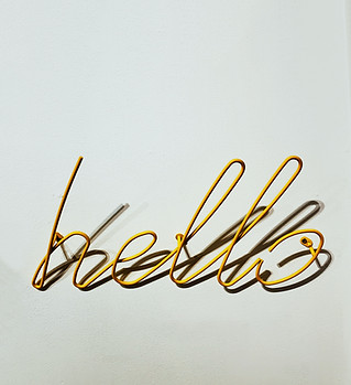 gold hello sign