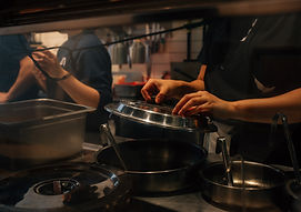 Japanese chefs preparing food for catering