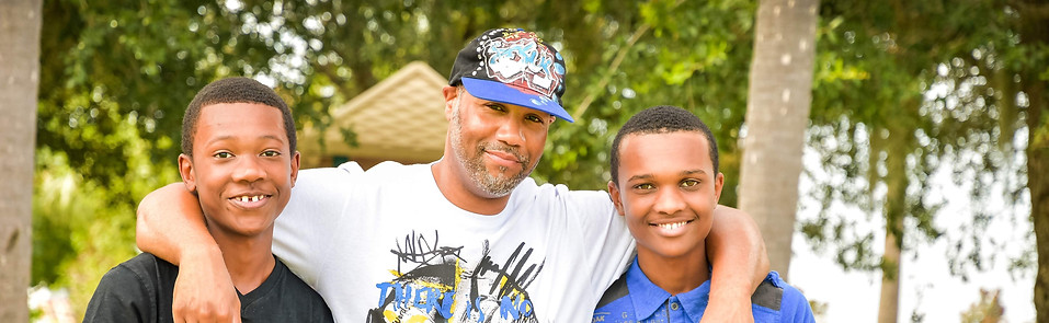 father with teenage sons in philadelphia after taking parenting support classes