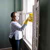 Caregiver doing light house keeping