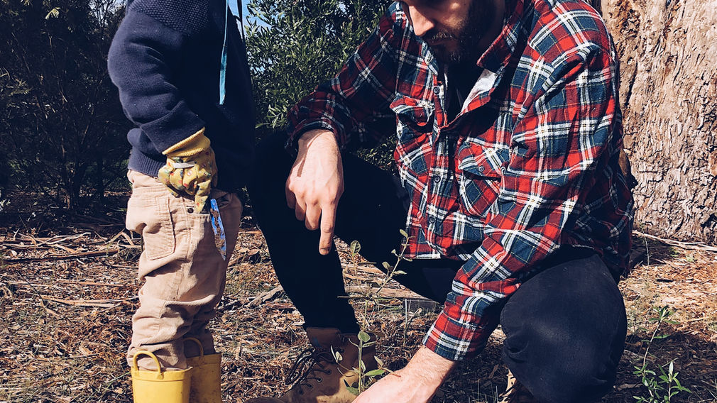a dad with his son in the outdoors