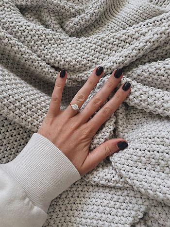 A female wearing her engagement ring