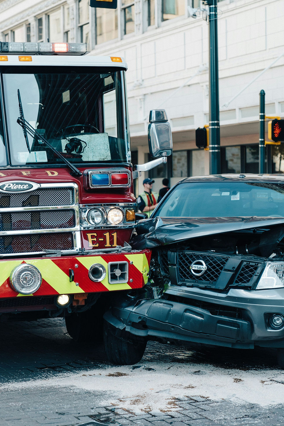 Damaged vehicles at the scene of a motor vehicle collision