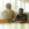 One-on-one consultation with young man in bright, welcoming office setting