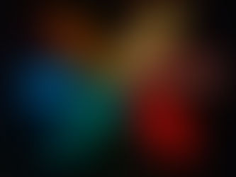 Colorful neon words "HUMAN", "NEED", "DREAM", "DESIRE", "HOPE" on a dark wall, creating a vibrant, thoughtful mood.