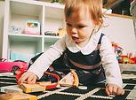 Child playing and learning at daycare
