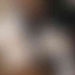 Flat lay of a coffee cup beside a lifestyle magazine and a laptop, symbolizing a cozy workspace for lifestyle bloggers building their personal brand.