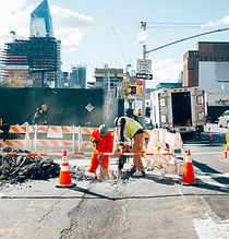 Construction workers working on a street