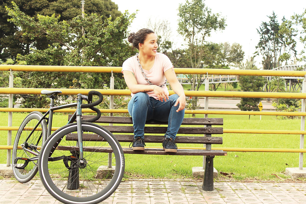 woman sitting on bench waiting