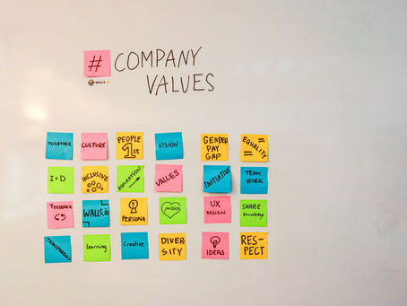 Board with sticky notes illustrating compliance planning steps