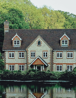 A house treated with moss prevention by drone, showcasing a clean roof free of moss growth, ensuring long-term protection and maintenance.