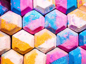 A vibrant array of multi-coloured bath bombs