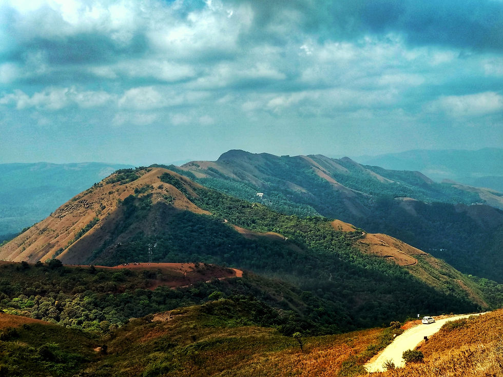 Thumbnail: Chikmagalur – A serene retreat in the Western Ghats, celebrated for its coffee estates, trekking trails, and panoramic peaks.