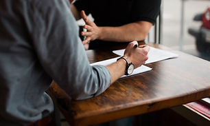 Patient and family member negotiating a settlement for a medical injury
