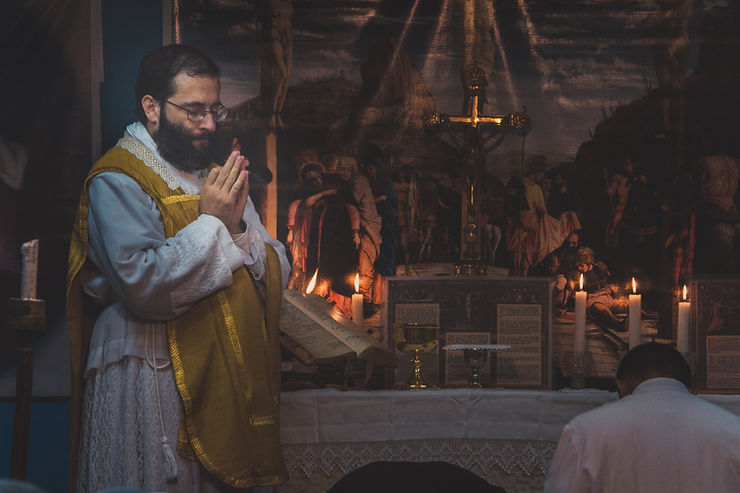 priest in persona Christi, mediator between God and Man at Mass