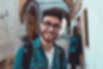 Smiling man representing benefits of gestalt therapy as a somatic therapy