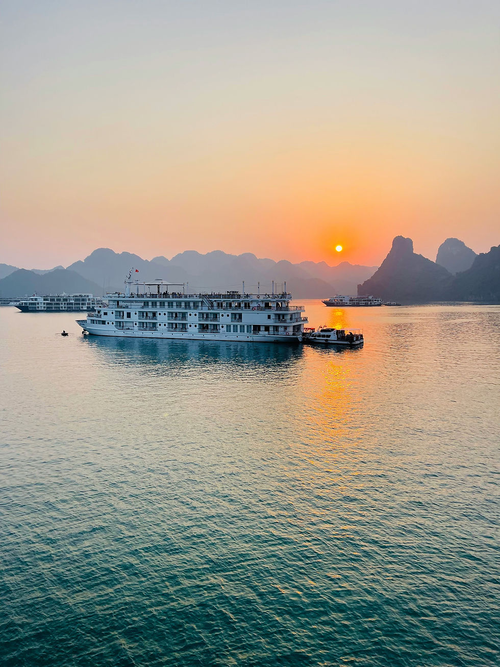 Halong Bay cruise ship at sunrise