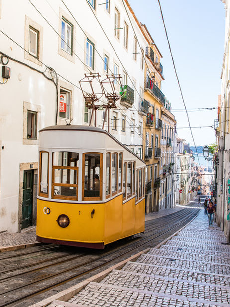 lisbon-tram-narrow-street-portugal