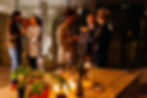 Corporate event lunch setup with white linen tables and branding