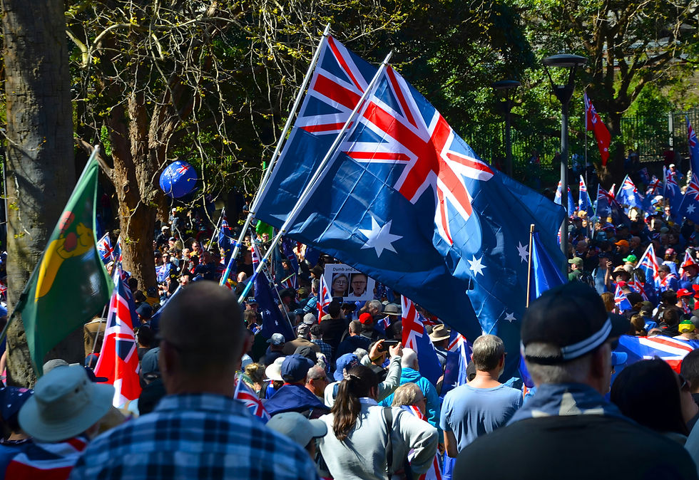 crowd holding aussie flags