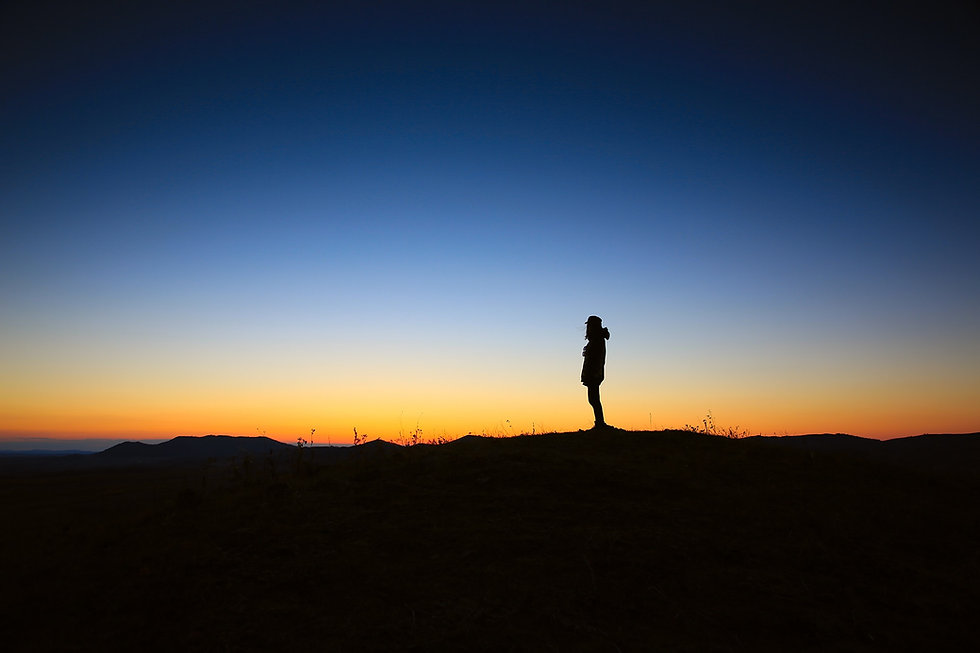 Sonnenaufgang mit Person