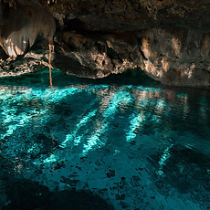 Shadows and lights at a cenote water