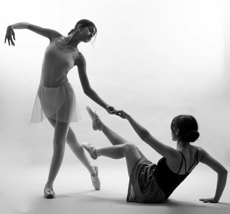 Image description: Two adolescent ballet dancers exploring safeguarding through creative activity
